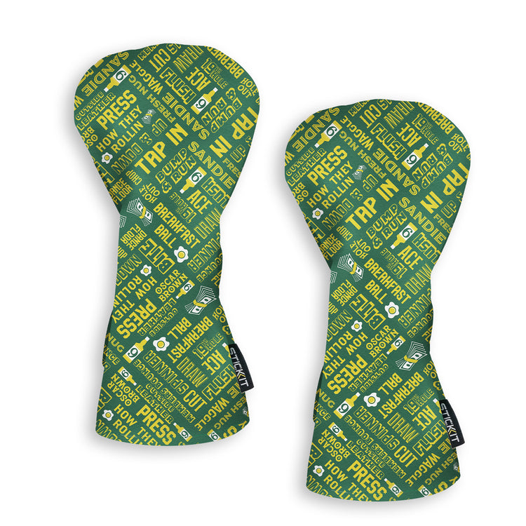 Green and yellow patterned golf headcovers featuring fun phrases and graphics, crafted from durable materials.