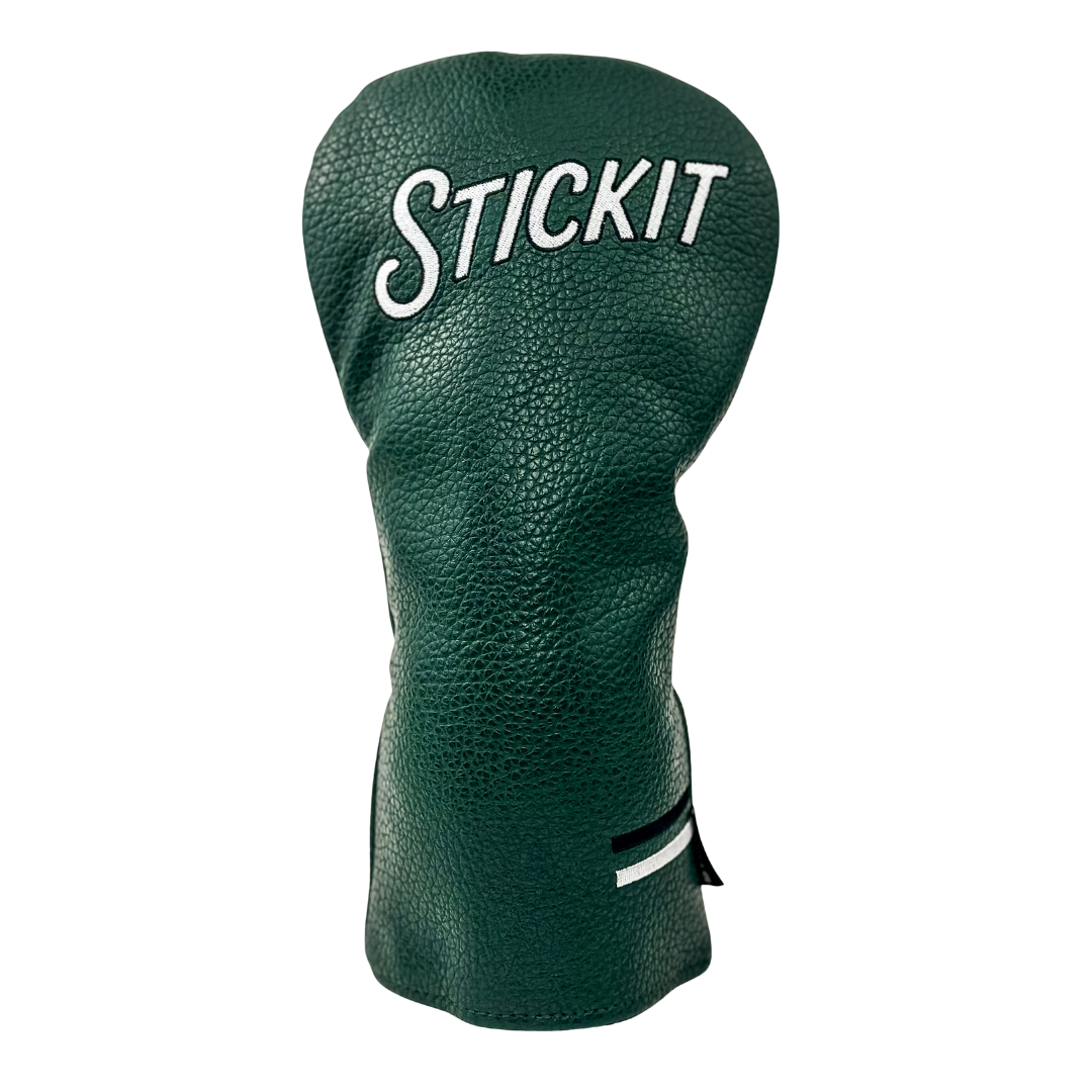 Green leather golf headcover with "STICKIT" text and striped accents on the side.