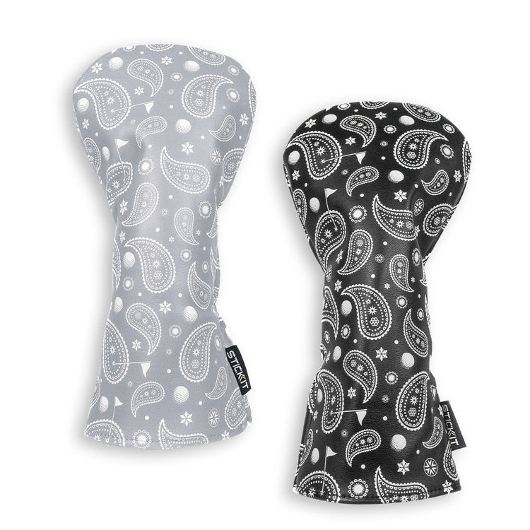 Set of two paisley print oven mitts in black and gray, made from durable cotton with quilted lining.