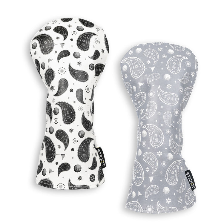 Set of two paisley-patterned oven mitts in black and white, and light gray, made of durable cotton fabric.