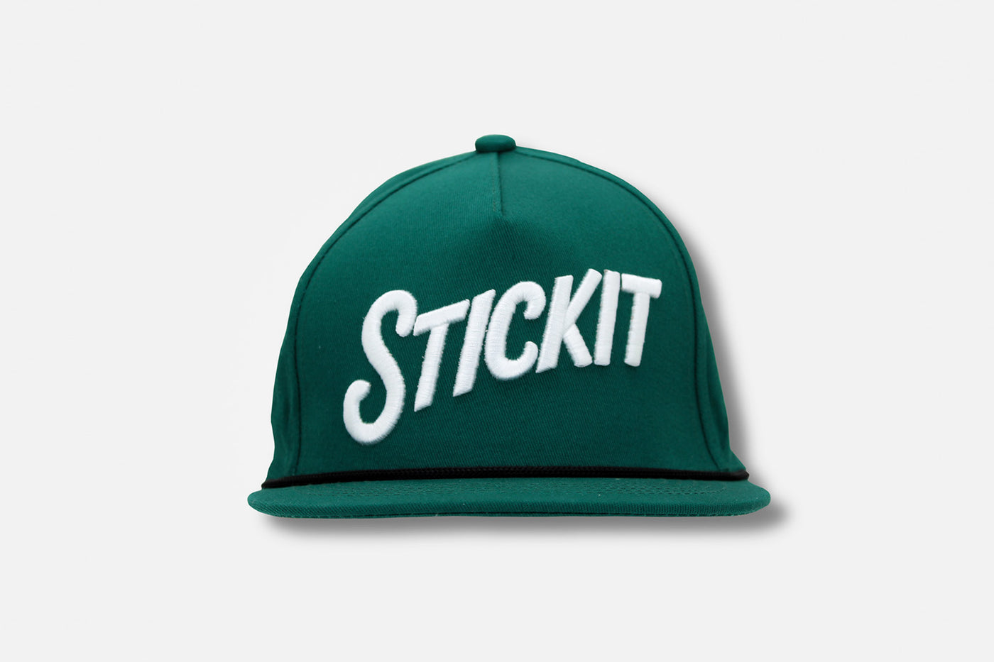 Green snapback hat with white "STICKIT" embroidery and a black accent band.