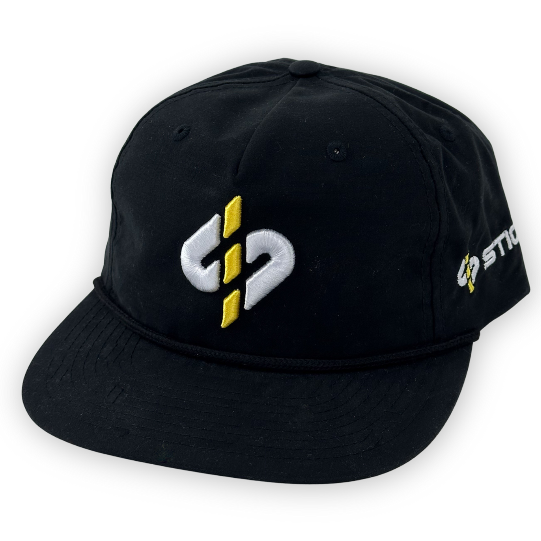 Black baseball cap with yellow and white embroidered logo, featuring a classic strapback style.
