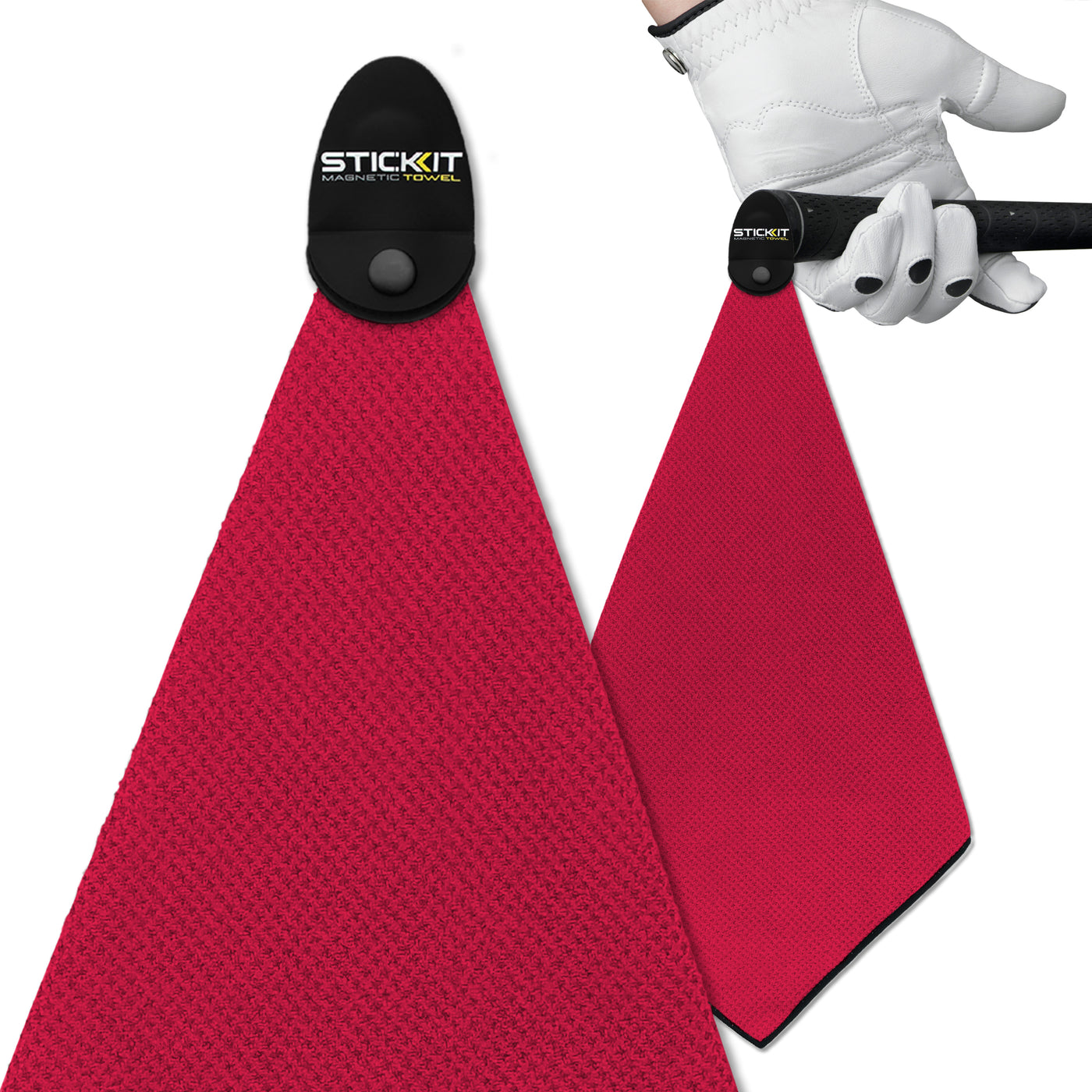 Magenta microfiber golf towel with magnetic clip, ideal for easy access during games. Durable and stylish accessory.